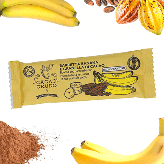 Barretta banana, mandorle e datteri ricoperta di granella di cacao – 30 g